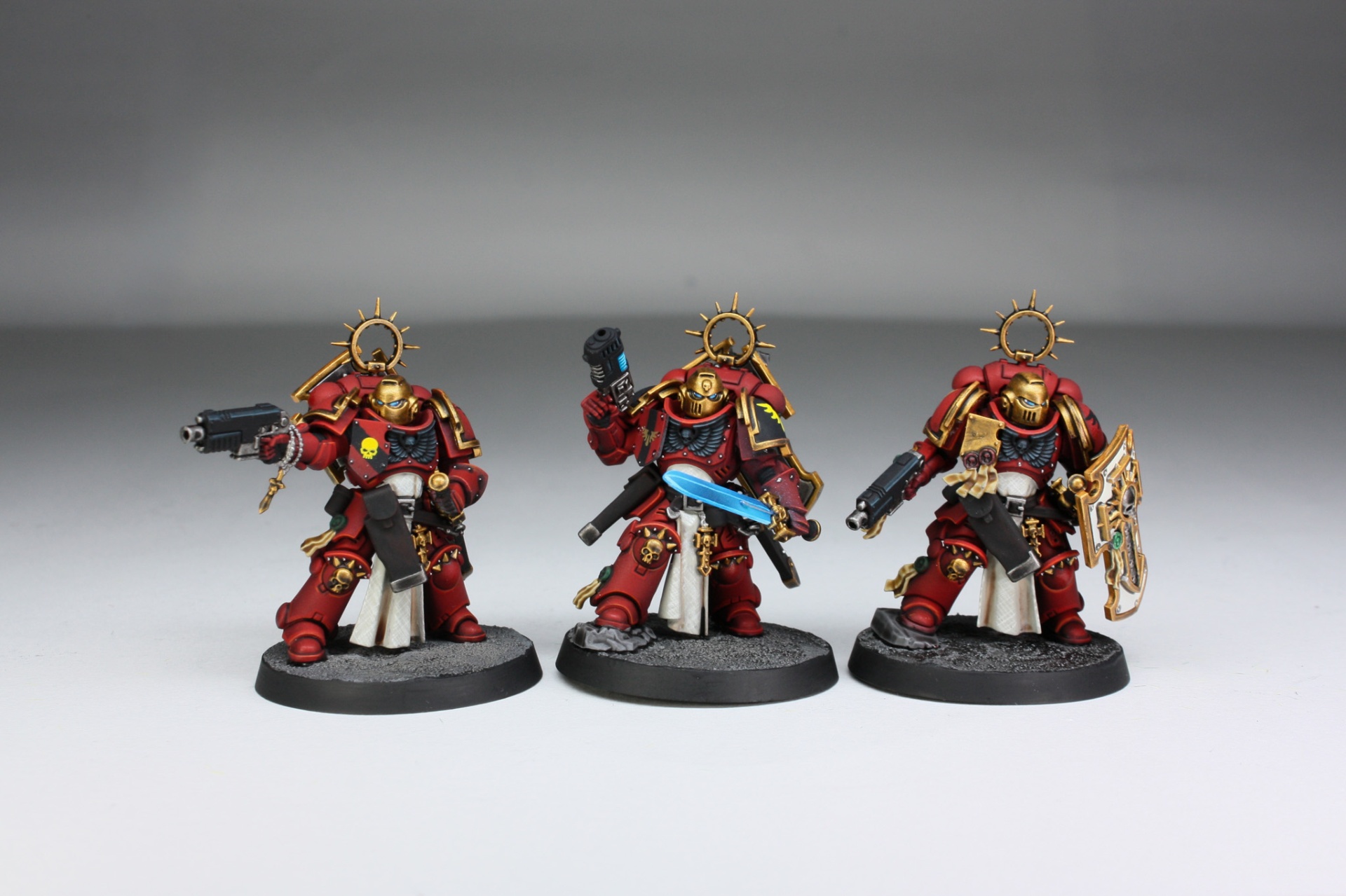 Blood Angels Bladeguard Veterans trio with halos and gold trim