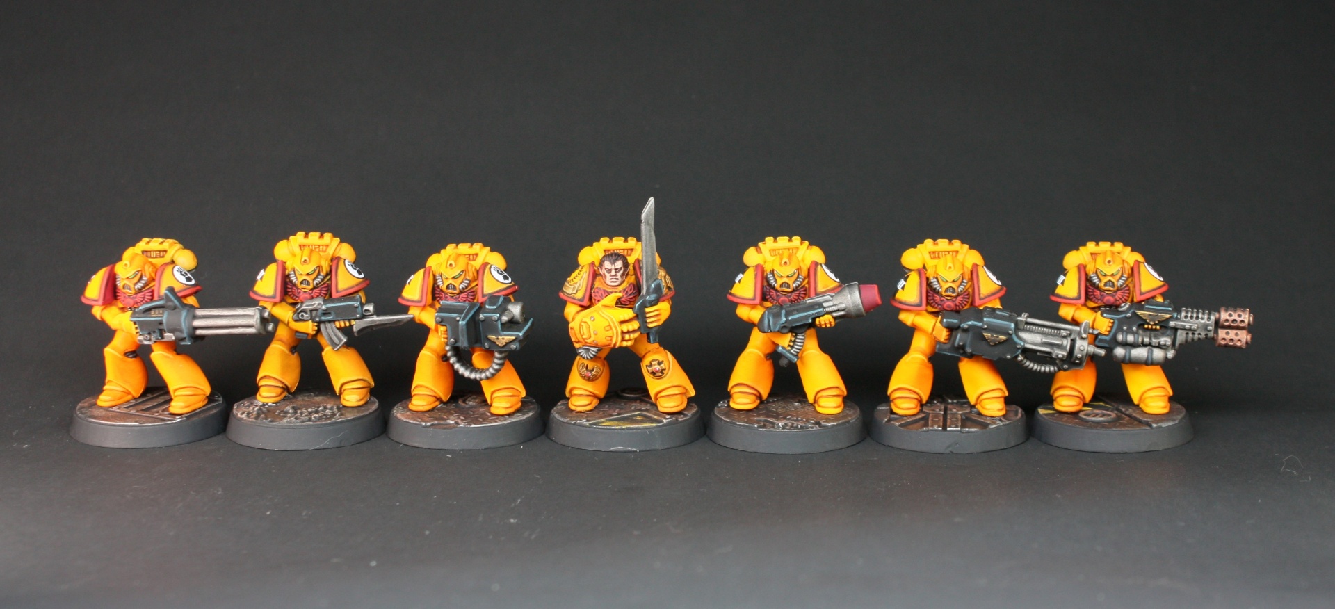 Classic Imperial Fists tactical squad in bright yellow armour with red trim