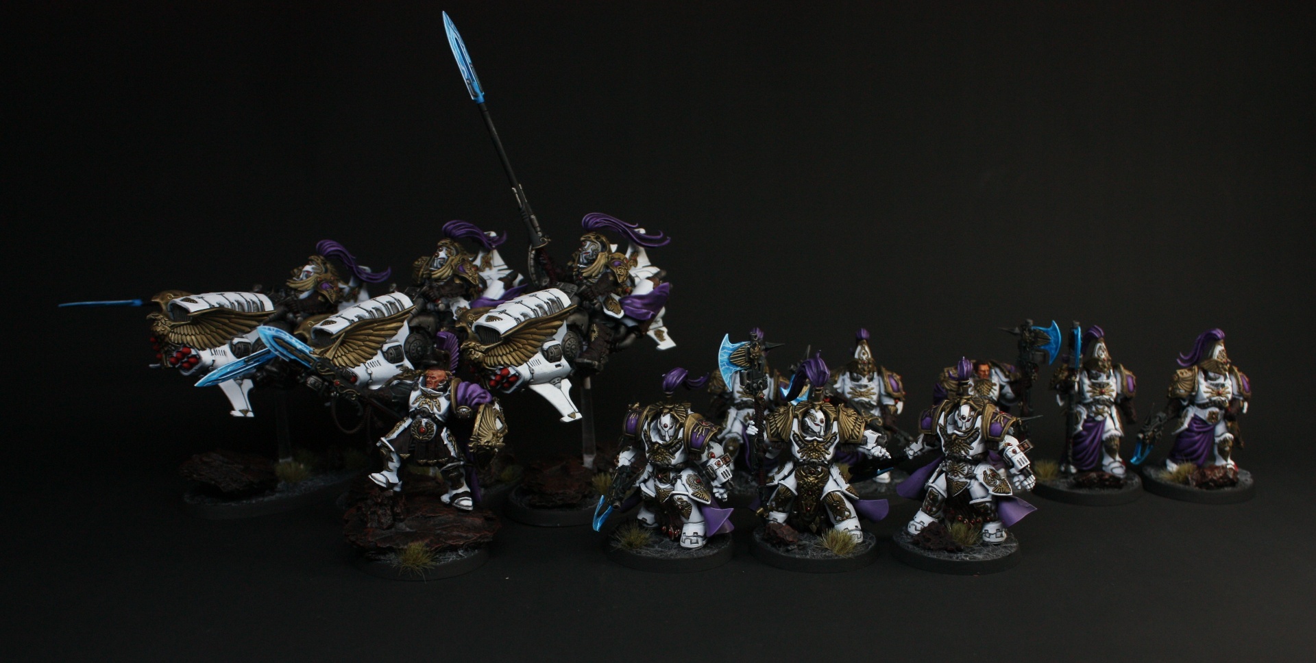 Full Adeptus Custodes battleforce in white and purple with Dawneagle jetbikes