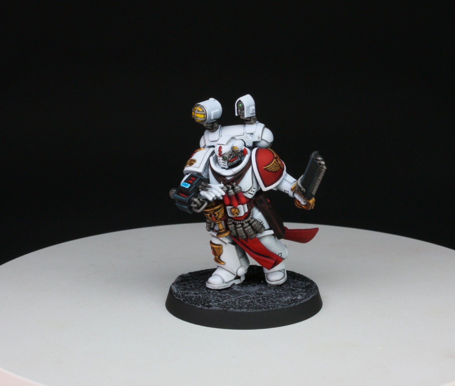 Blood Angels Apothecary in white armour with medical tools