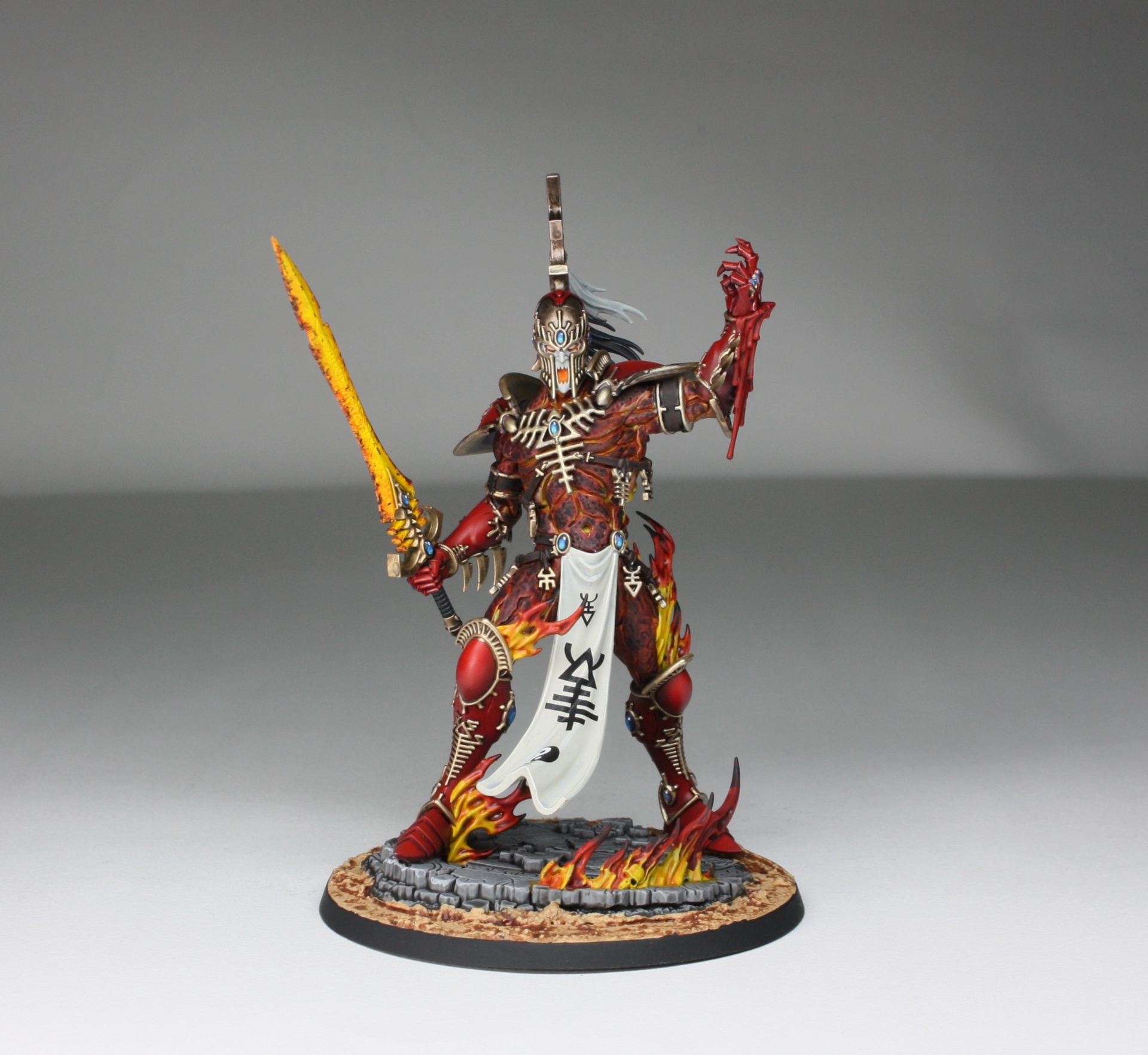 Avatar of Khaine display piece with flaming sword and molten body