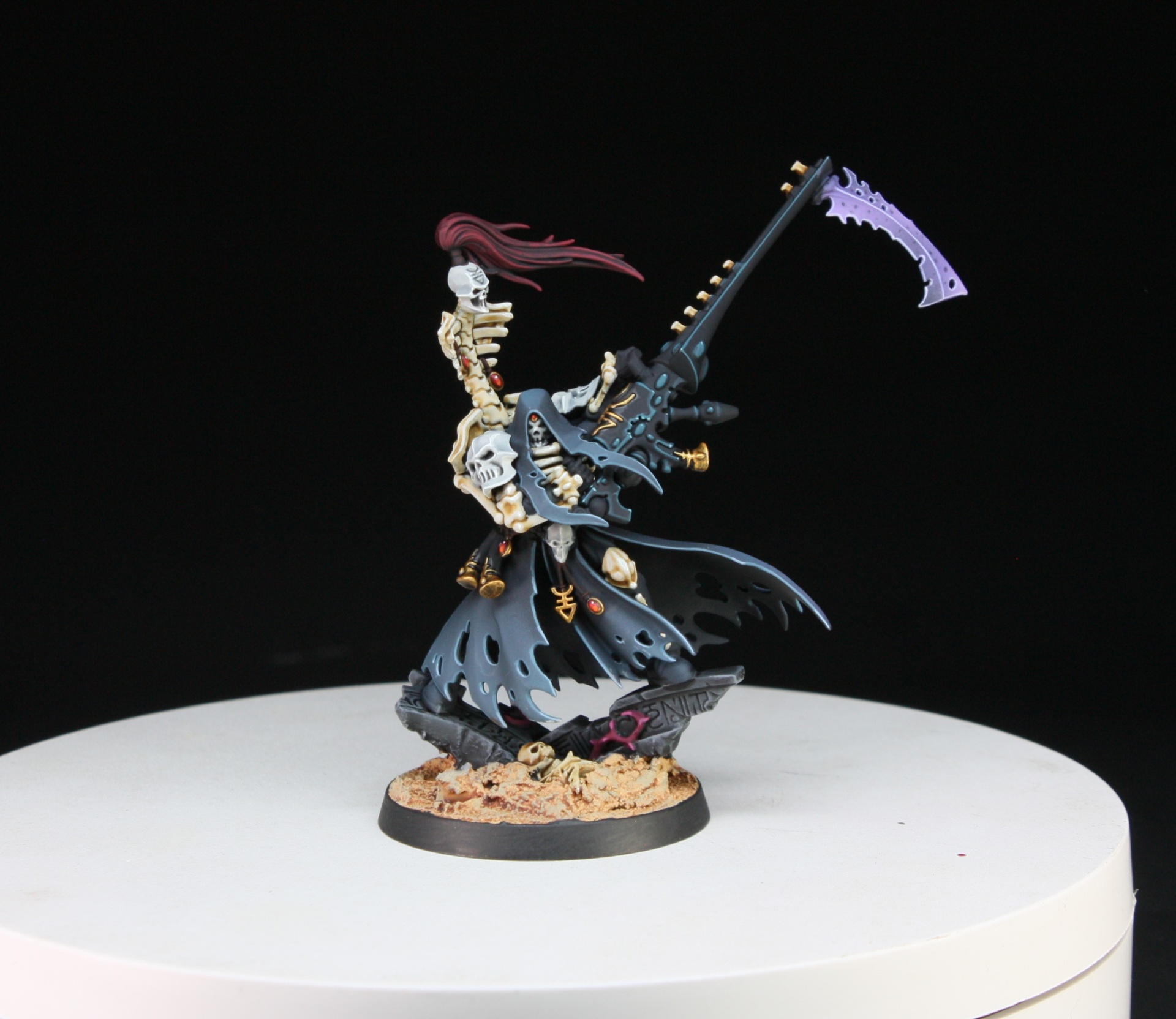 Maugan Ra Phoenix Lord with executioner scythe and skeletal cloak