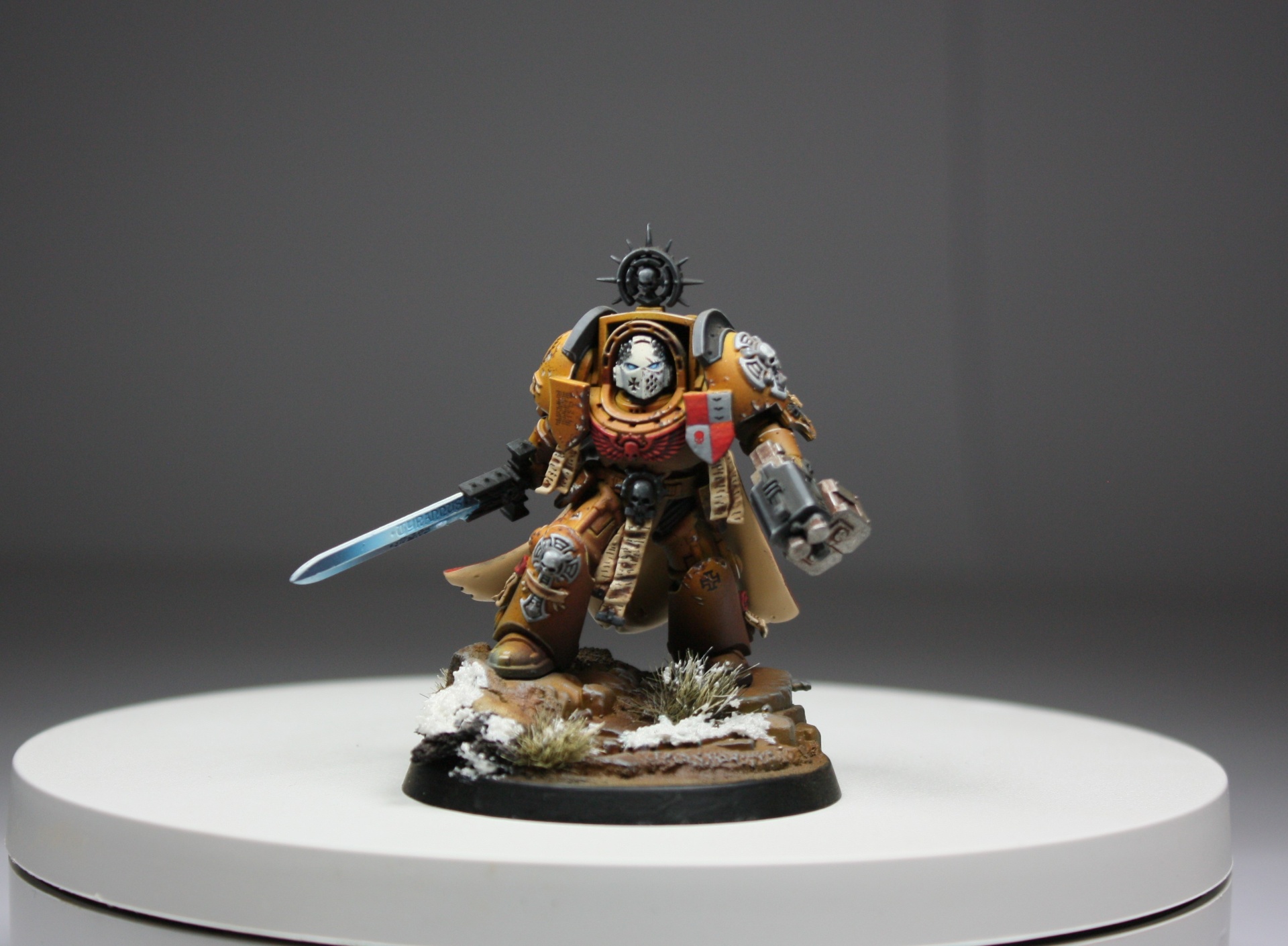 Imperial Fists Terminator Captain with glowing blue power sword and combi-melta