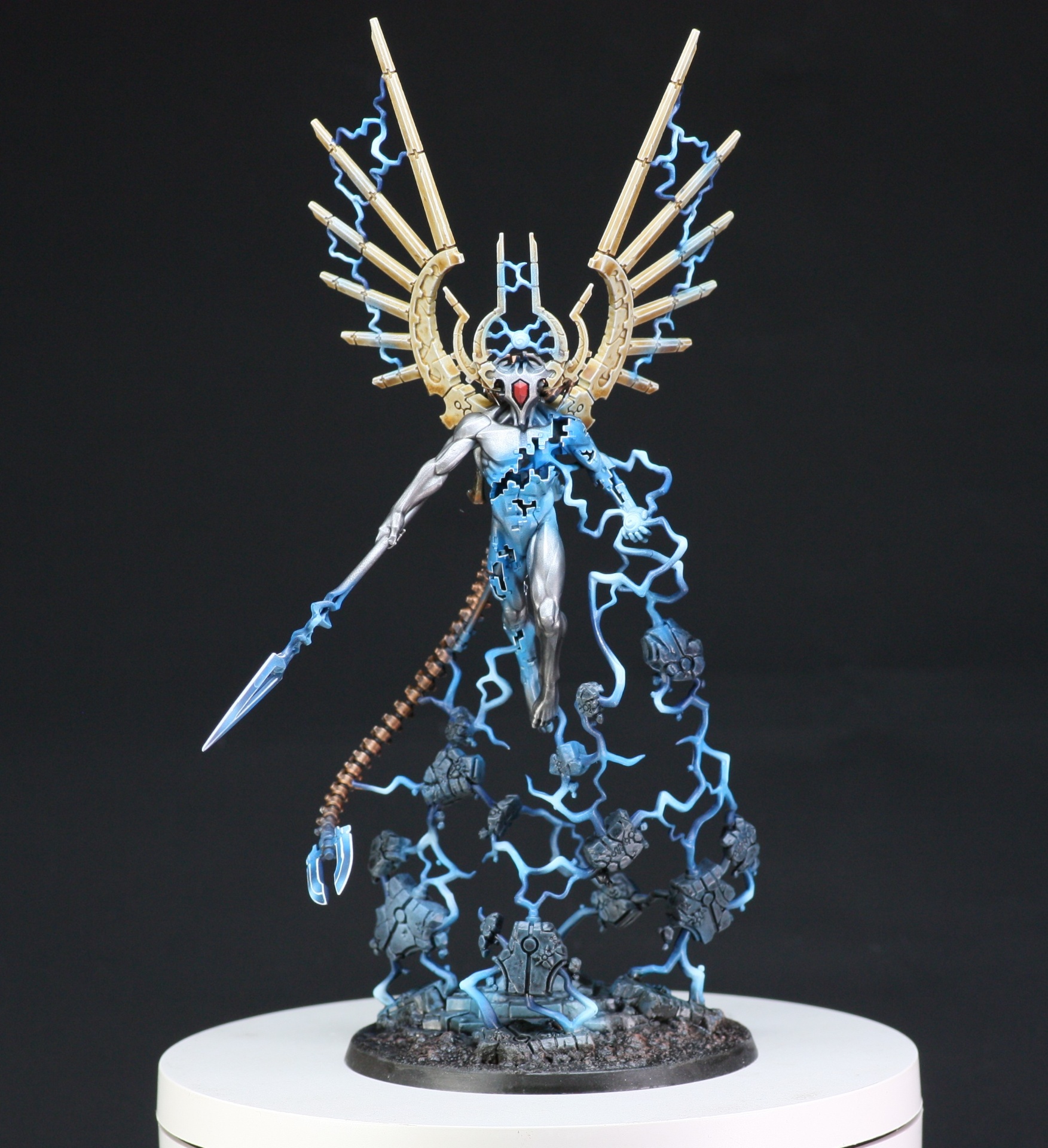 C'tan Shard of the Void Dragon with golden wings and arcing blue lightning