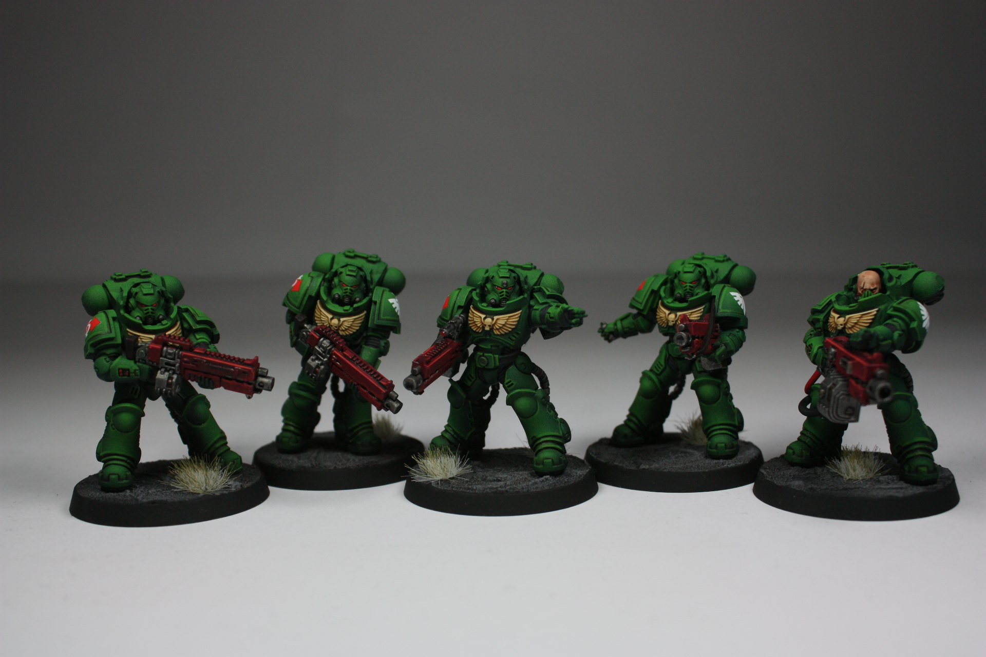 Dark Angels Heavy Intercessors in green armour with red heavy bolt rifles