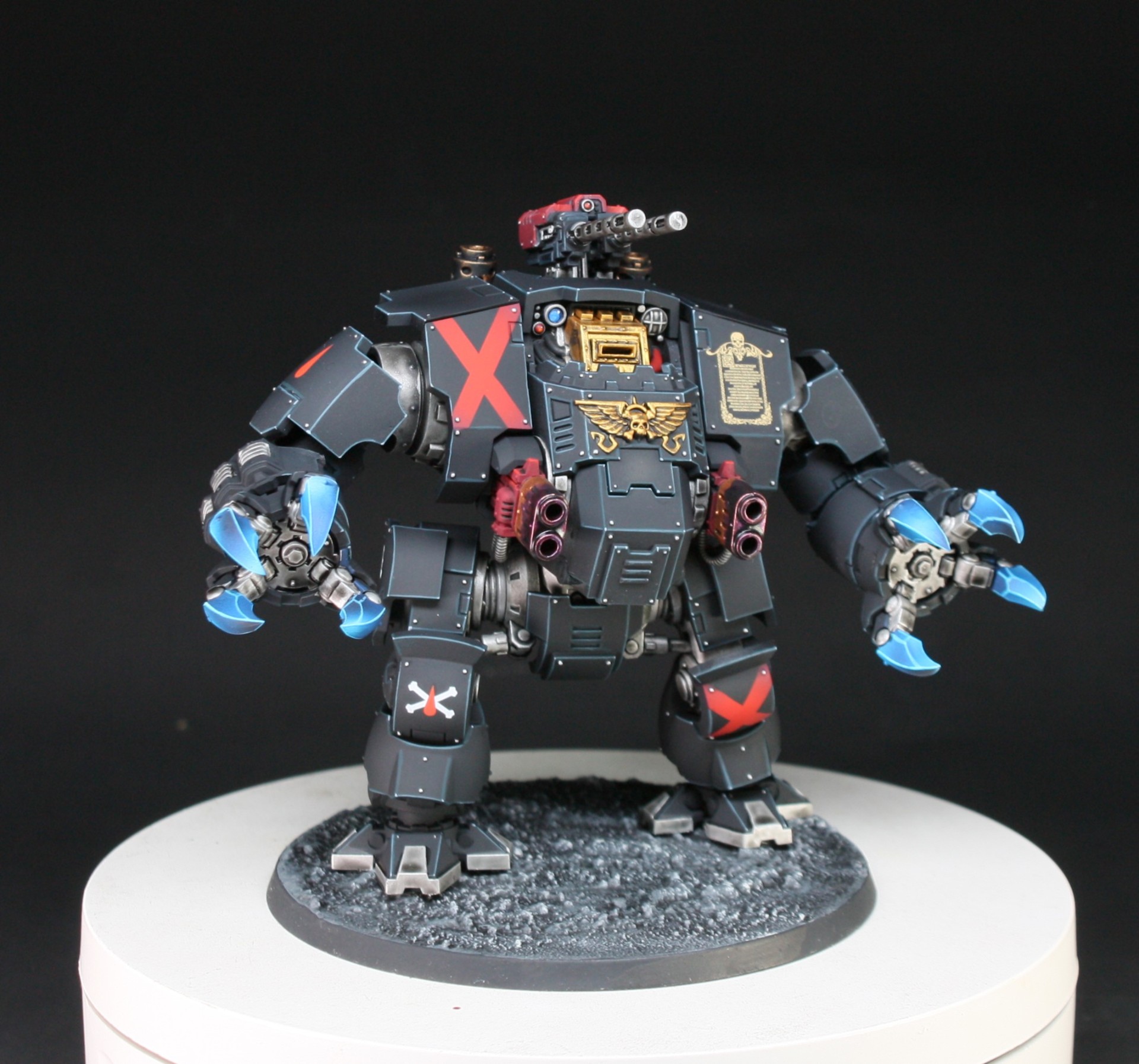 Death Company Brutalis Dreadnought in black with red X markings and blue talons