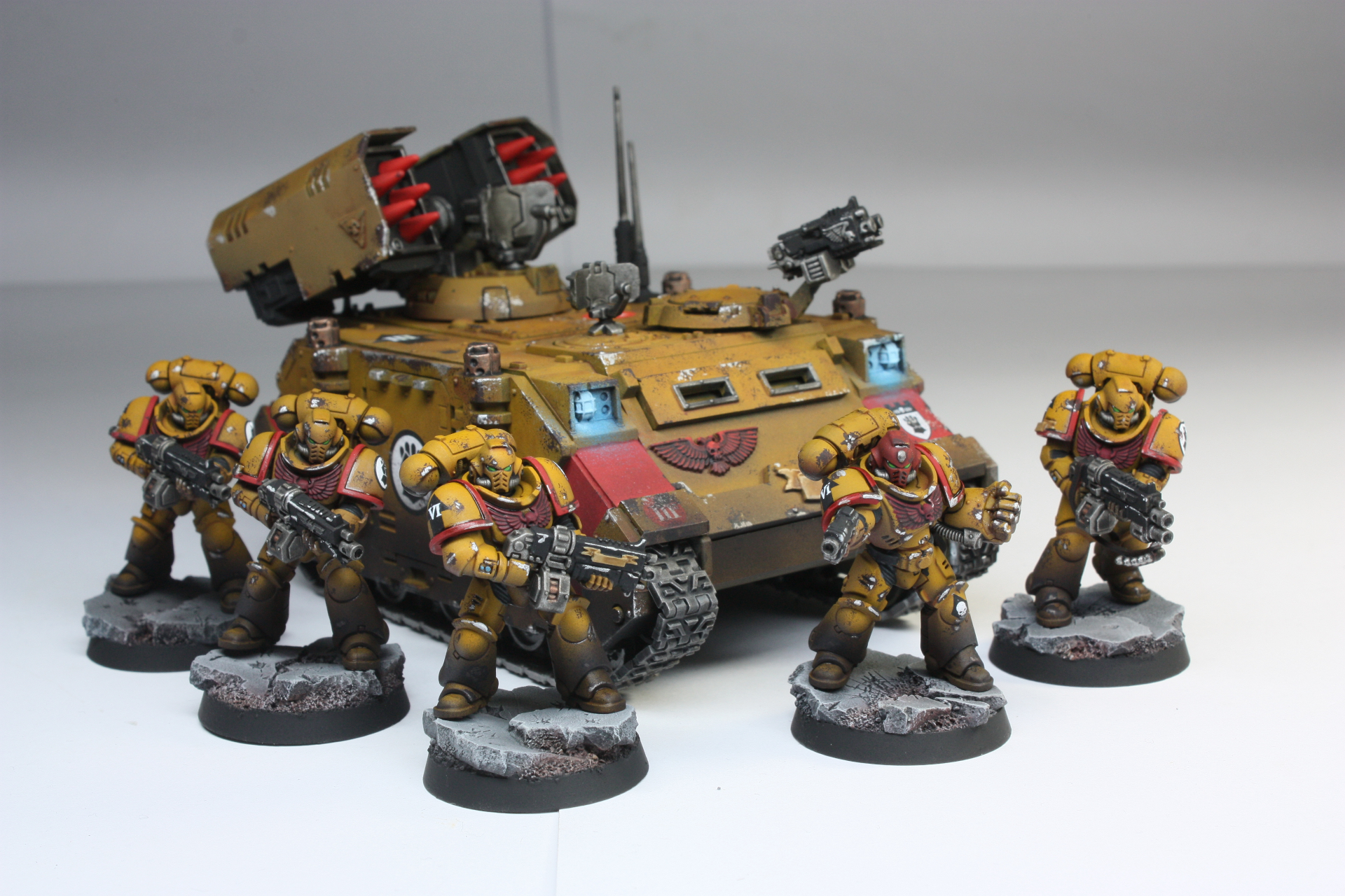 Imperial Fists intercessor squad with weathered Whirlwind missile tank