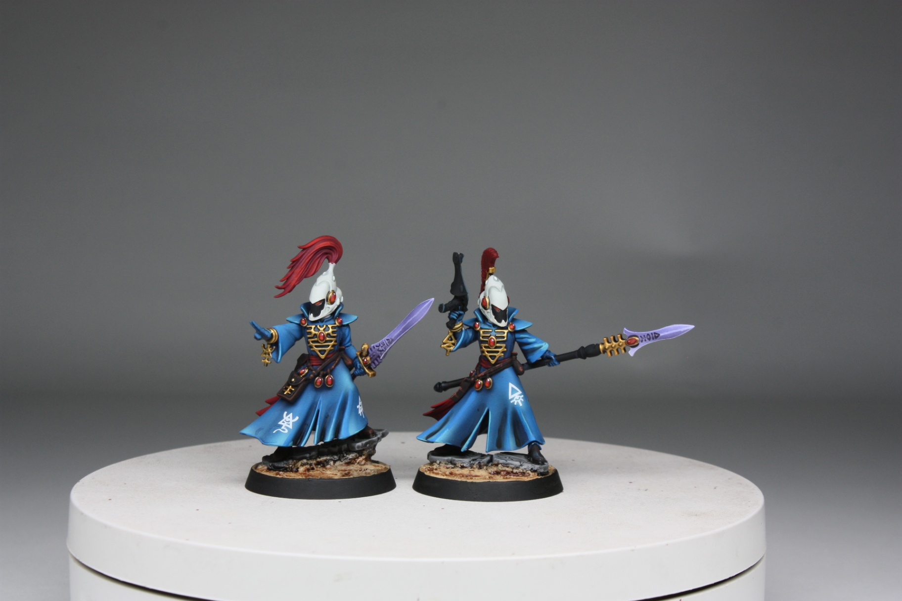 Aeldari Warlocks in cobalt robes with witchblades