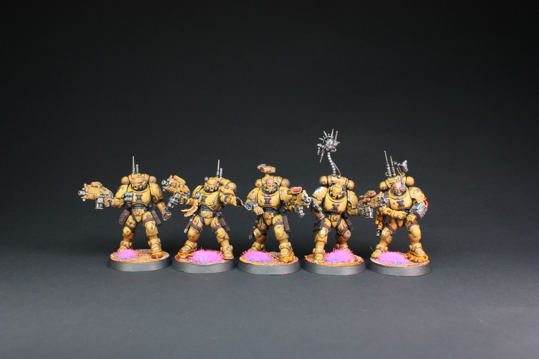 Squad of Imperial Fists intercessors in yellow armor